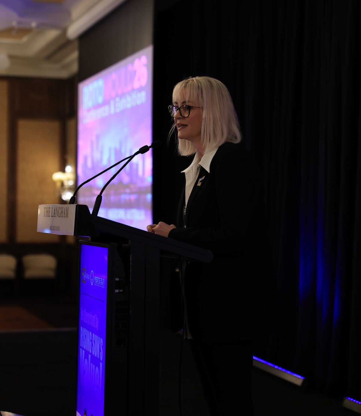 Michelle Rose presenting at a conference